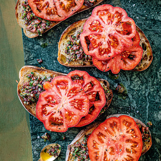 Beefsteak Tomatoes with Black Olive and Orange Tapenade